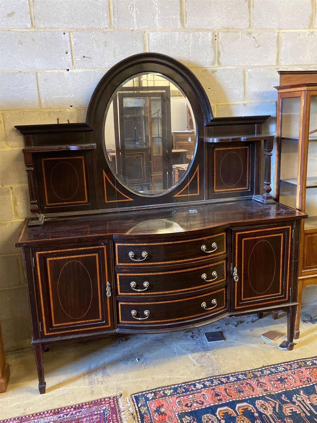 An Edwardian satinwood banded mahogany sideboard, with mirrored superstructure, width 169cm
